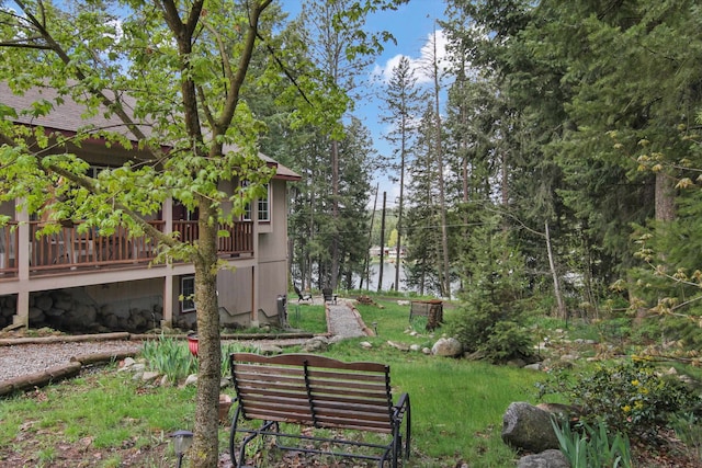 9306 E Lake Rd, Elk, WA 99009 - view of property's community with a yard and a wooden deck