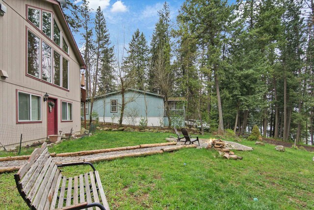 9306 E Lake Rd, Elk, WA 99009 - view of yard with an outdoor fire pit