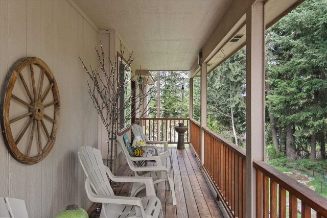 9306 E Lake Rd, Elk, WA 99009 - wooden deck with covered porch
