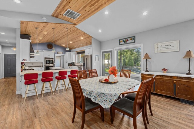 dining area with light wood-type flooring, recessed lighting, lofted ceiling, and wood ceiling