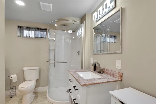 bathroom featuring tile patterned floors, toilet, vanity, visible vents, and a stall shower