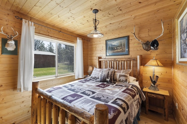 bedroom featuring wood walls, wooden ceiling, and wood-type flooring