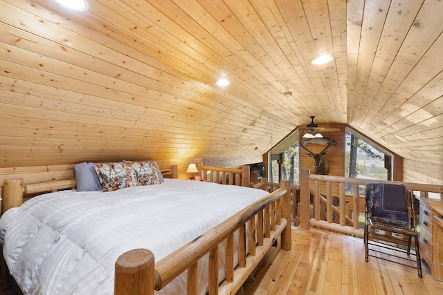 bedroom with lofted ceiling, wood walls, wooden ceiling, light wood-type flooring, and recessed lighting