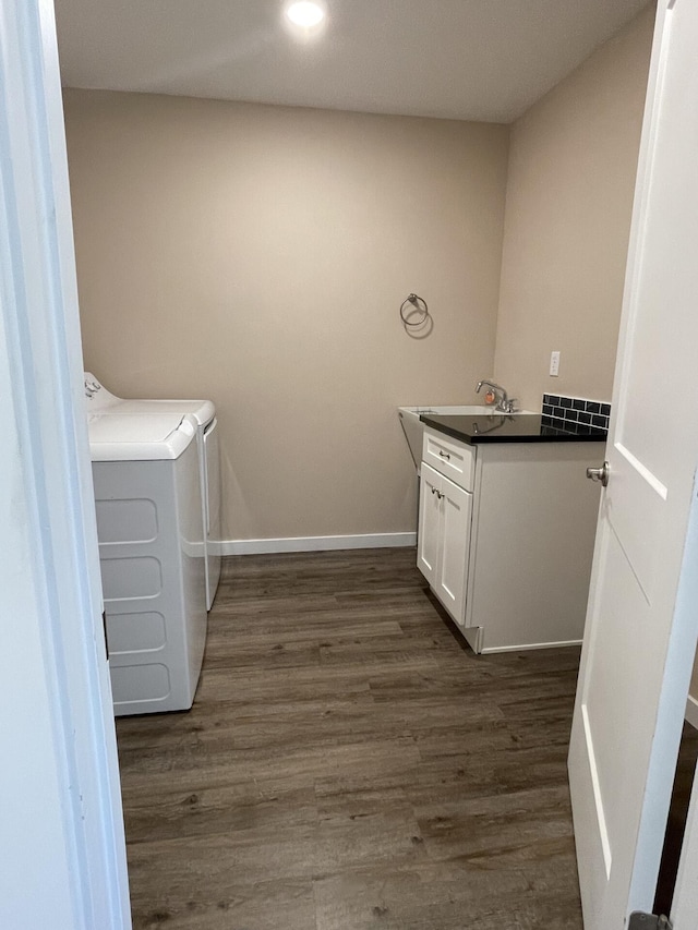 2942 W 18th Ave, Spokane, WA 99224 - laundry room featuring washing machine and clothes dryer, baseboards, recessed lighting, cabinet space, and dark wood finished floors