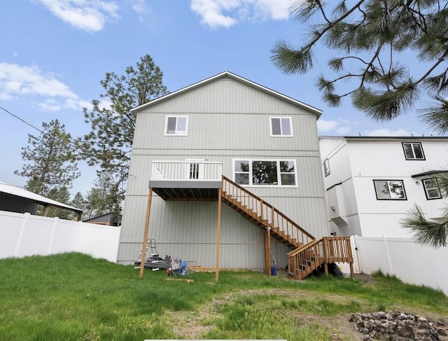 2942 W 18th Ave, Spokane, WA 99224 - back of property with fence, a yard, and stairs