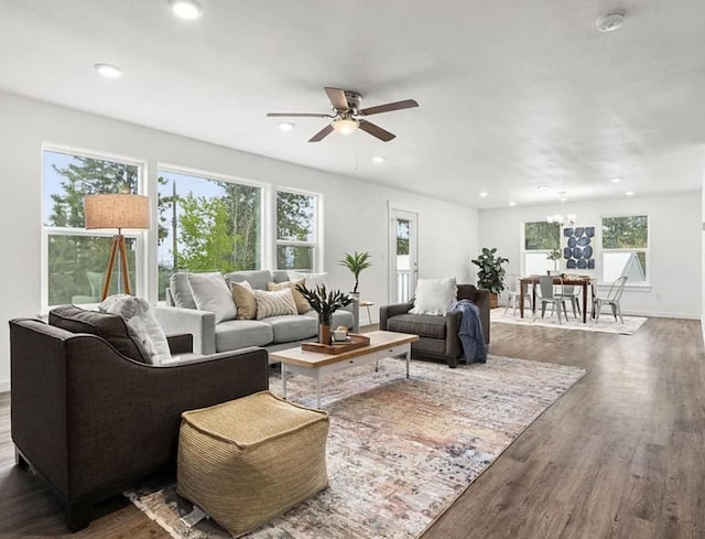 2942 W 18th Ave, Spokane, WA 99224 - living room featuring recessed lighting, dark wood-style flooring, and ceiling fan with notable chandelier