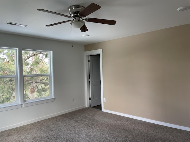 2942 W 18th Ave, Spokane, WA 99224 - carpeted empty room with a ceiling fan, visible vents, and baseboards