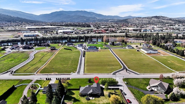 bird's eye view featuring a water and mountain view