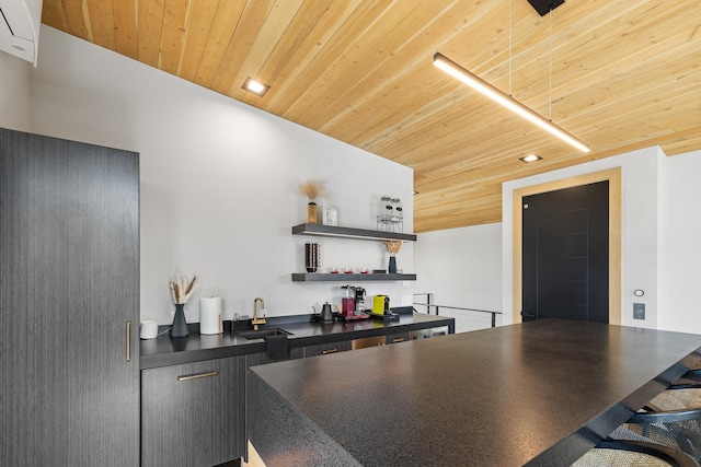 kitchen with wooden ceiling, recessed lighting, open shelves, dark countertops, and a sink
