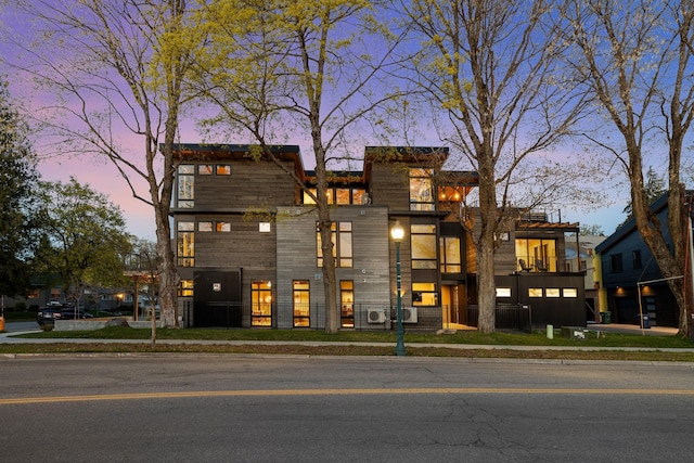 view of front facade with a balcony