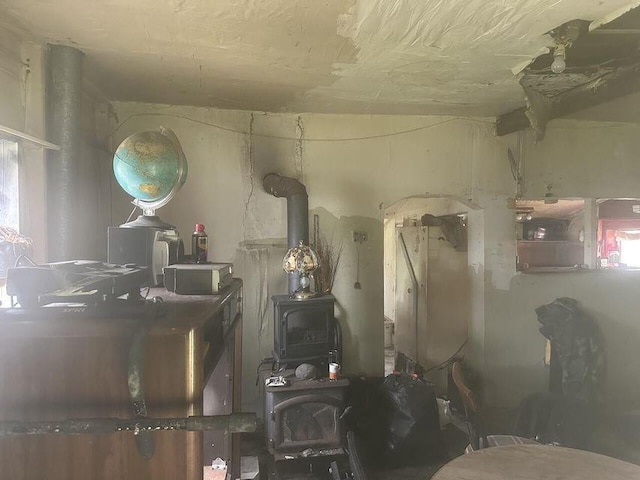 miscellaneous room with a wood stove