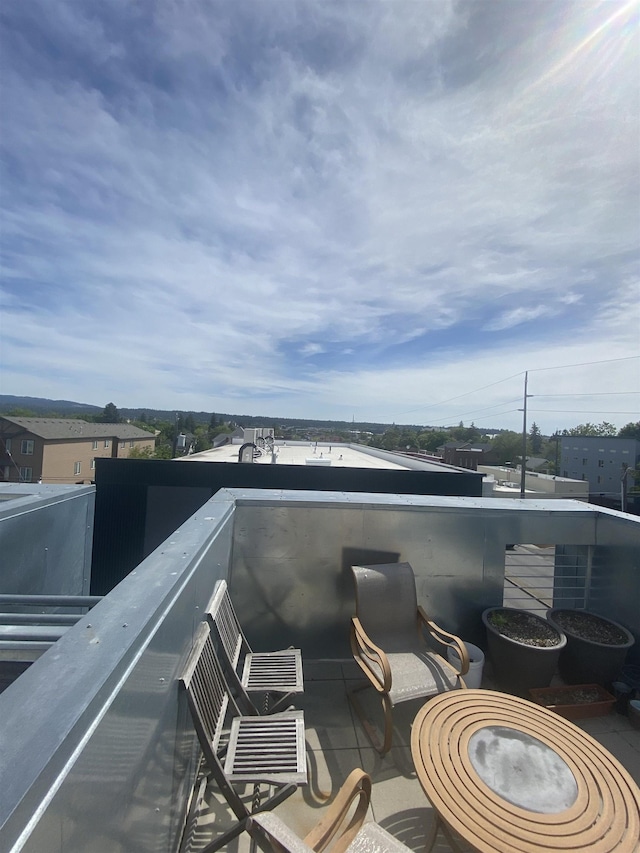 view of patio / terrace with a balcony