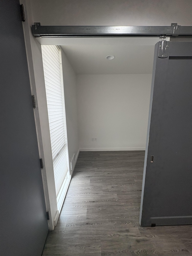 904 E Indiana Ave, Spokane, WA 99207 - hallway featuring wood finished floors and baseboards