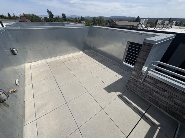 904 E Indiana Ave, Spokane, WA 99207 - view of patio / terrace with a mountain view
