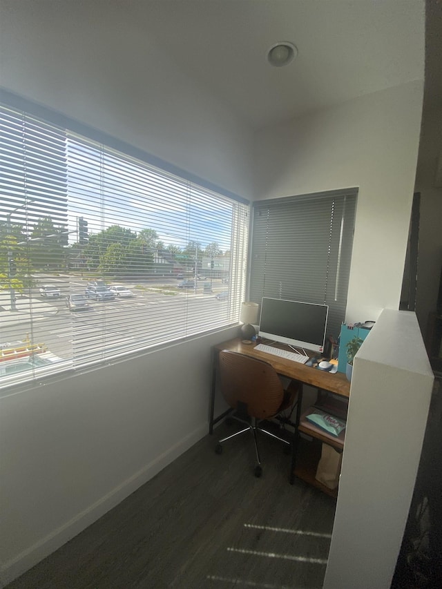 office area featuring baseboards and wood finished floors