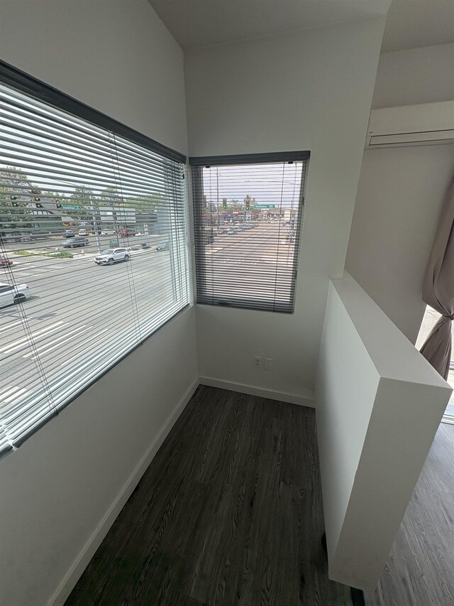 904 E Indiana Ave, Spokane, WA 99207 - empty room featuring wood finished floors and baseboards