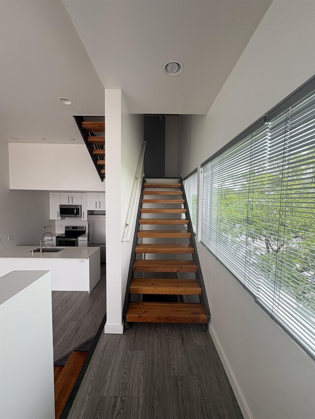 904 E Indiana Ave, Spokane, WA 99207 - stairway featuring wood finished floors and recessed lighting