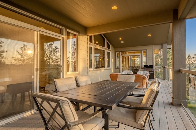 sunroom with beamed ceiling