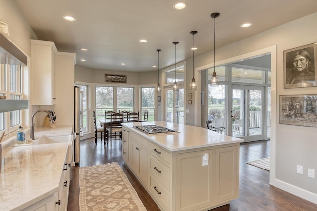 kitchen with recessed lighting, dark wood-style floors, and stainless steel appliances