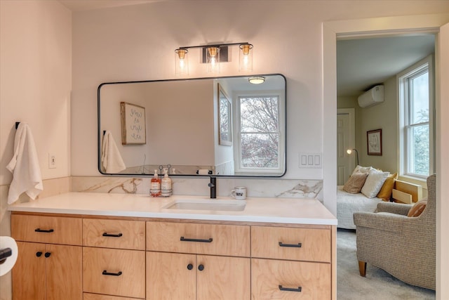 bathroom with vanity and a wall unit AC