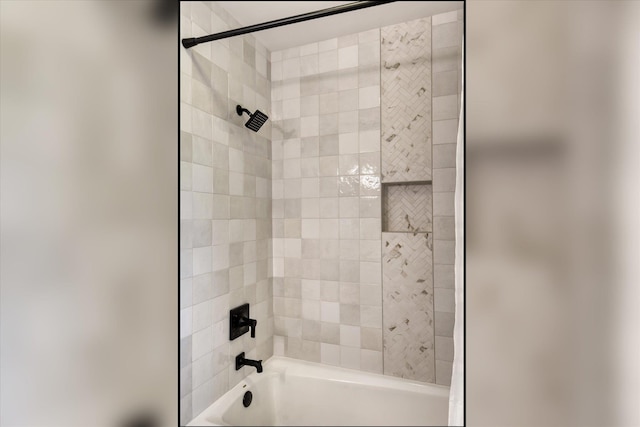 bathroom featuring washtub / shower combination
