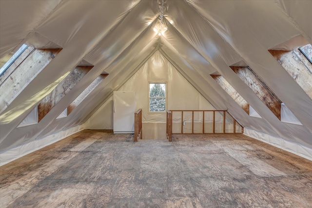 bonus room featuring vaulted ceiling