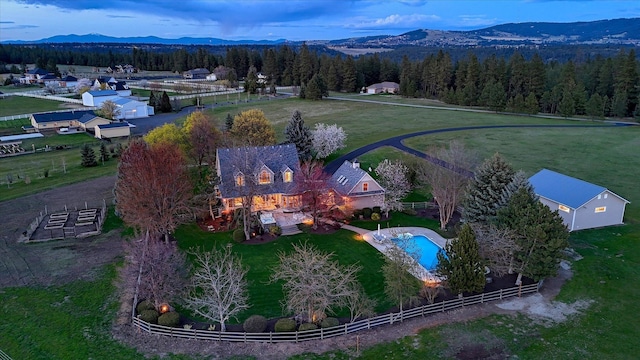 bird's eye view featuring a mountain view and a wooded view