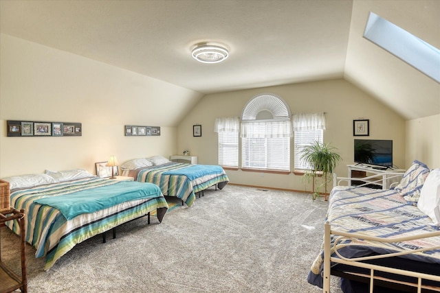bedroom with baseboards, carpet, and vaulted ceiling
