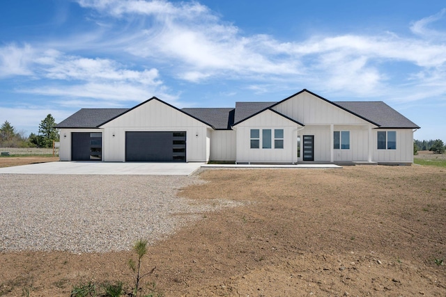 3621 W Montgomery Rd, Deer Park, WA 99006 - modern inspired farmhouse featuring an attached garage, board and batten siding, and driveway