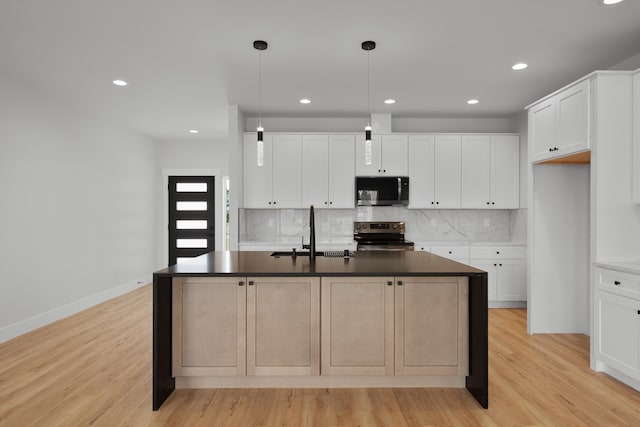 3621 W Montgomery Rd, Deer Park, WA 99006 - kitchen featuring backsplash, dark countertops, appliances with stainless steel finishes, and a sink