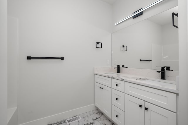 3621 W Montgomery Rd, Deer Park, WA 99006 - full bath with double vanity, baseboards, a sink, and marble finish floor