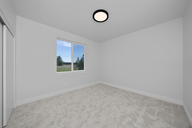 3621 W Montgomery Rd, Deer Park, WA 99006 - unfurnished bedroom with carpet floors, baseboards, and a closet
