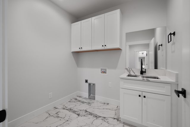 3621 W Montgomery Rd, Deer Park, WA 99006 - laundry room with cabinet space, a sink, hookup for a washing machine, marble finish floor, and hookup for an electric dryer