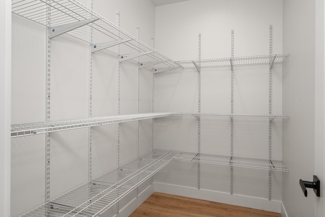 3621 W Montgomery Rd, Deer Park, WA 99006 - walk in closet featuring wood finished floors