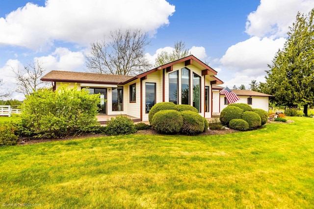 7525 N Prairie Crest Rd, Spokane, WA 99224 - rear view of house with a lawn