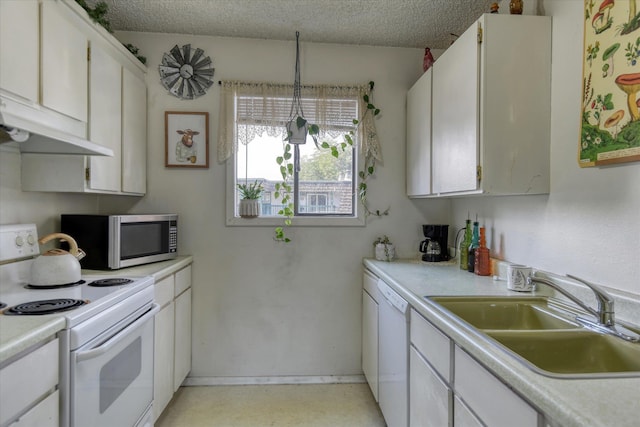 2121 E Upriver Dr # 19, Spokane, WA 99207 - kitchen featuring a sink, white cabinetry, white appliances, and light countertops