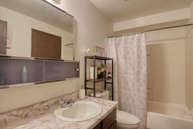 2121 E Upriver Dr # 19, Spokane, WA 99207 - full bathroom featuring vanity, shower / bathtub combination with curtain, a textured wall, and toilet