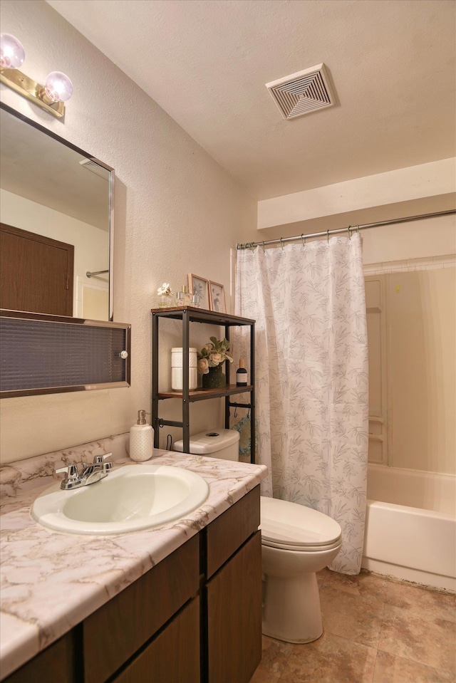 2121 E Upriver Dr # 19, Spokane, WA 99207 - bathroom with visible vents, vanity, a textured wall, toilet, and shower / bath combo