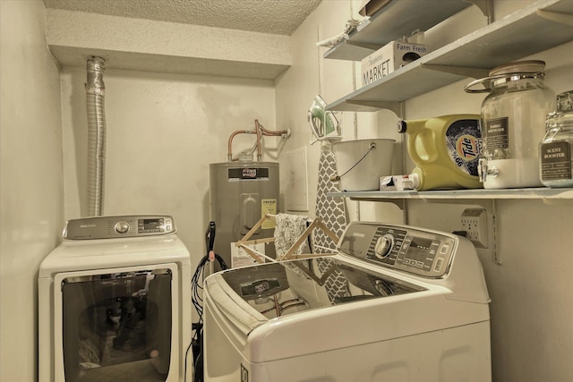 2121 E Upriver Dr # 19, Spokane, WA 99207 - clothes washing area with electric water heater, laundry area, a textured ceiling, and washing machine and clothes dryer