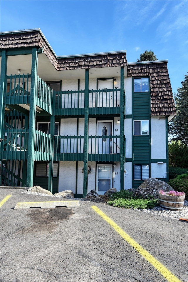 2121 E Upriver Dr # 19, Spokane, WA 99207 - view of building exterior with uncovered parking