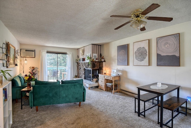 2121 E Upriver Dr # 19, Spokane, WA 99207 - living area with a stone fireplace, a ceiling fan, a textured ceiling, and carpet