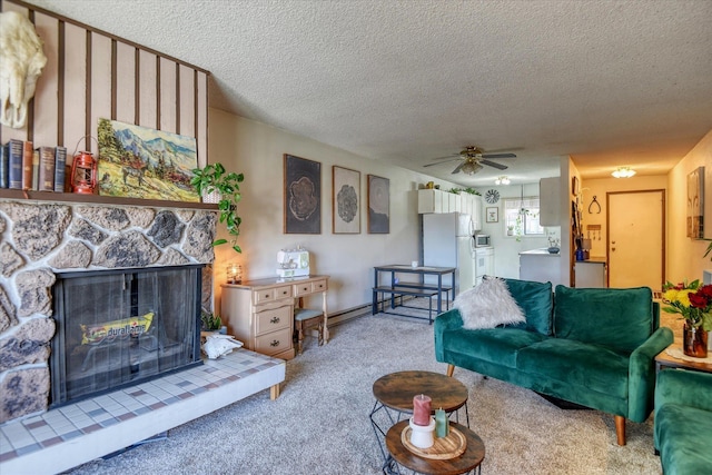 2121 E Upriver Dr # 19, Spokane, WA 99207 - carpeted living area featuring a stone fireplace, a ceiling fan, and a textured ceiling