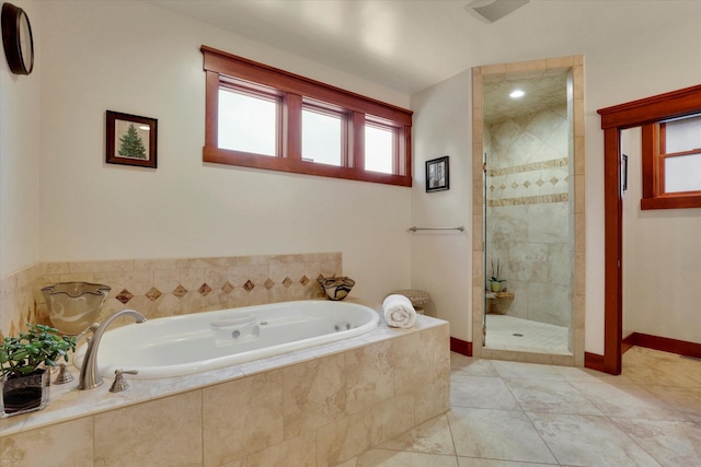 bathroom featuring visible vents, tile patterned floors, a bath, and a shower stall
