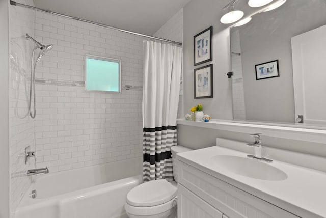 bathroom with vanity, toilet, and shower / tub combo with curtain