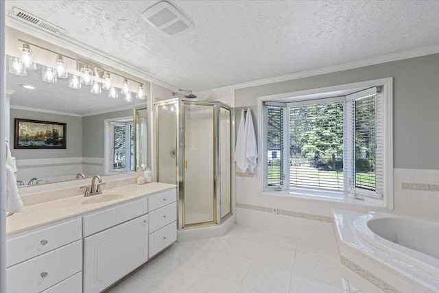 bathroom with tile patterned floors, a stall shower, and visible vents