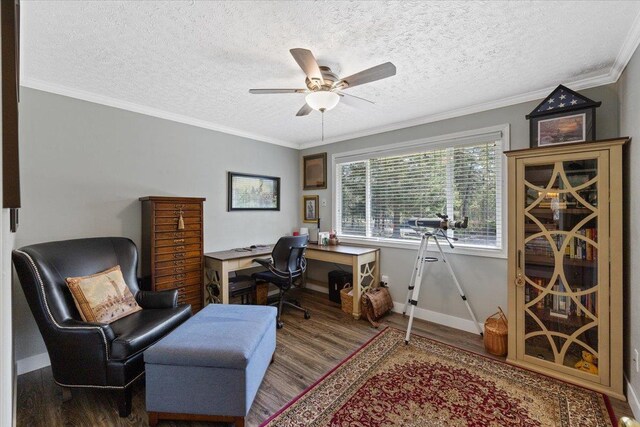 office space featuring baseboards, a ceiling fan, a textured ceiling, and wood finished floors
