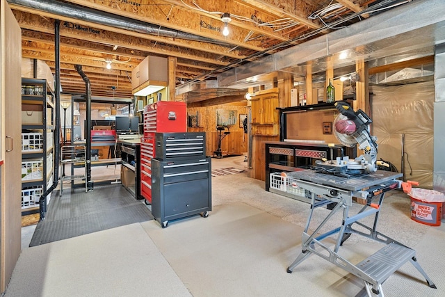 unfinished below grade area with a workshop area