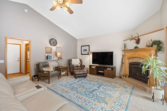 815 E Shelter Ln, Deer Park, WA 99006 - carpeted living room featuring ceiling fan, a tiled fireplace, and high vaulted ceiling