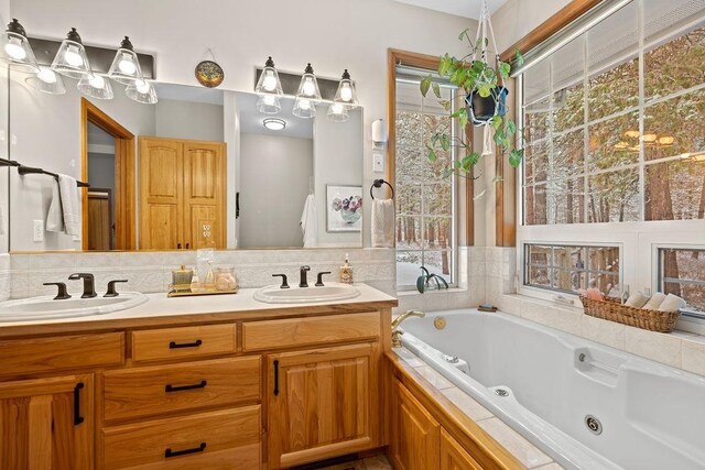 815 E Shelter Ln, Deer Park, WA 99006 - bathroom featuring a tub with jets and double vanity