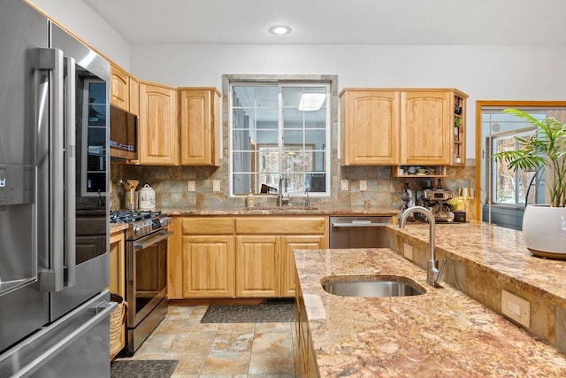 815 E Shelter Ln, Deer Park, WA 99006 - kitchen featuring stainless steel appliances, a sink, tasteful backsplash, and recessed lighting